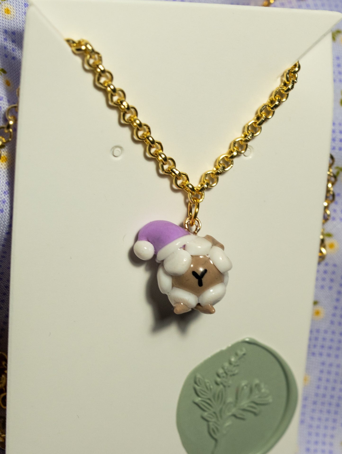 Barrrrrbra the Slumber Sheep necklace.