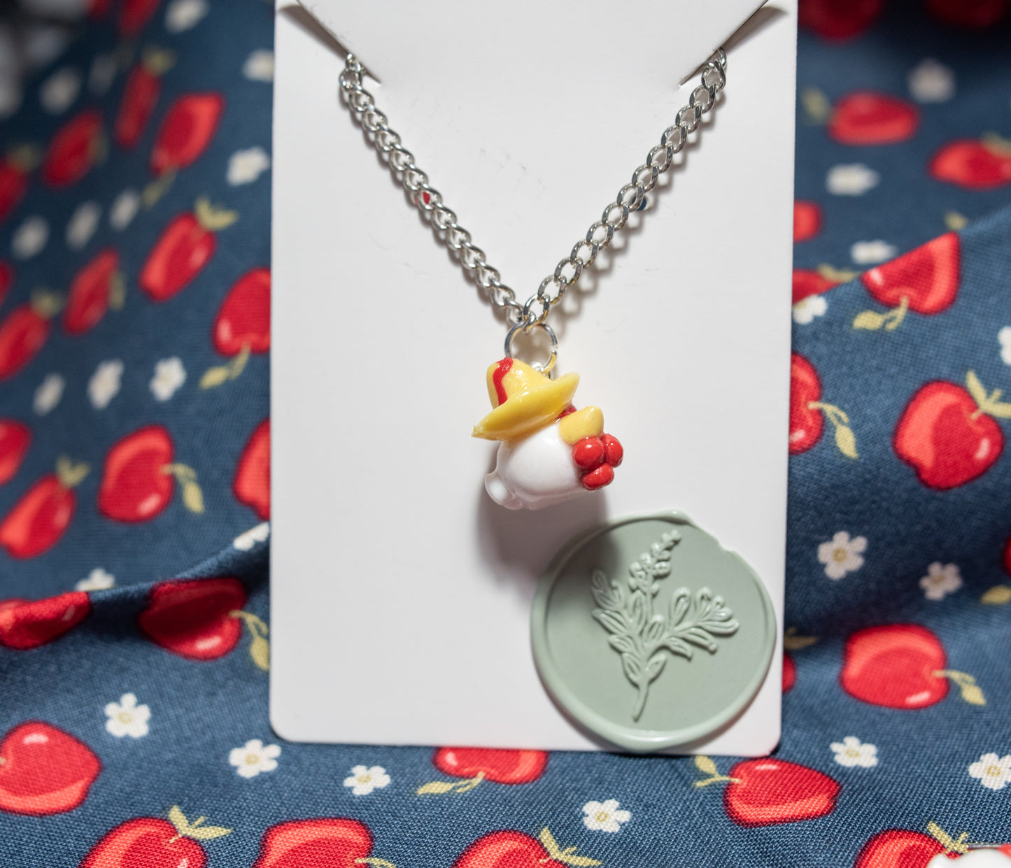 Señor Henrique chicken with sombrero necklace.