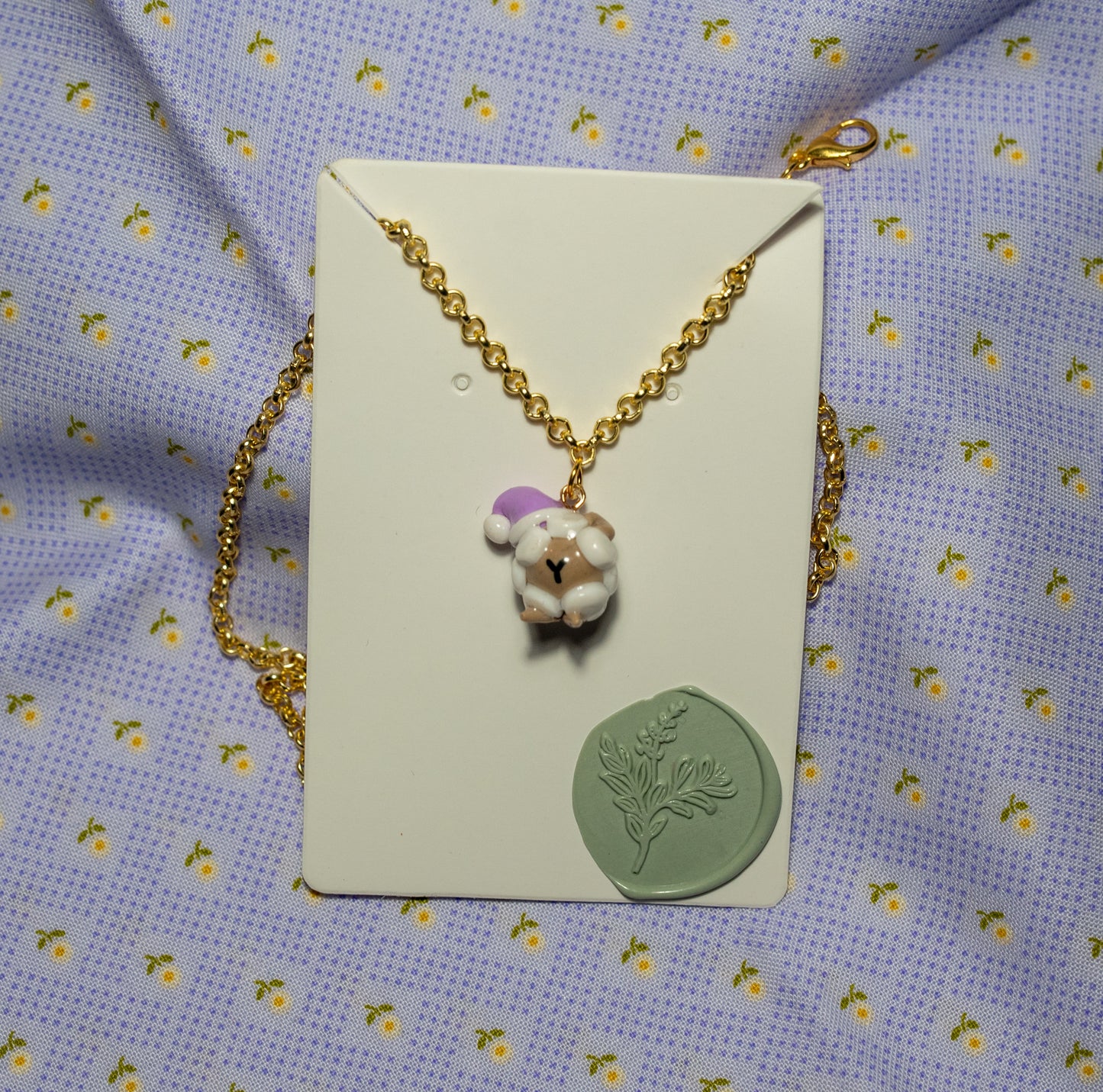 Barrrrrbra the Slumber Sheep necklace.